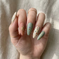 sage green terracotta matte almond press on nails terrazzo gold flake mockup 01