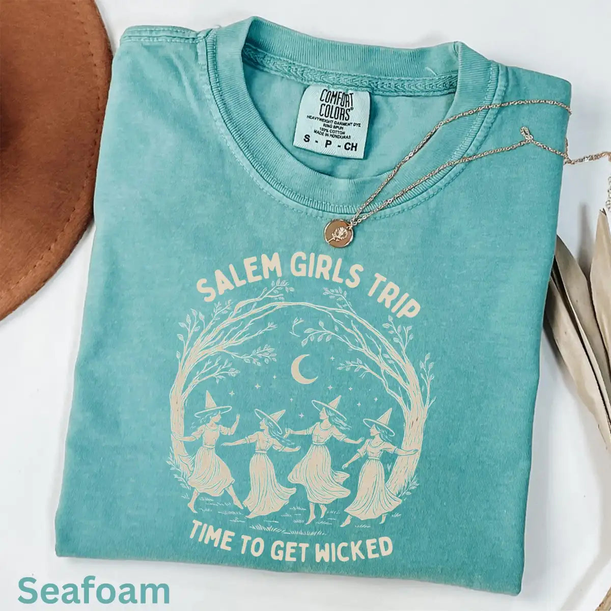 Comfort Colors T-shirt in Moss featuring forest witches graphic