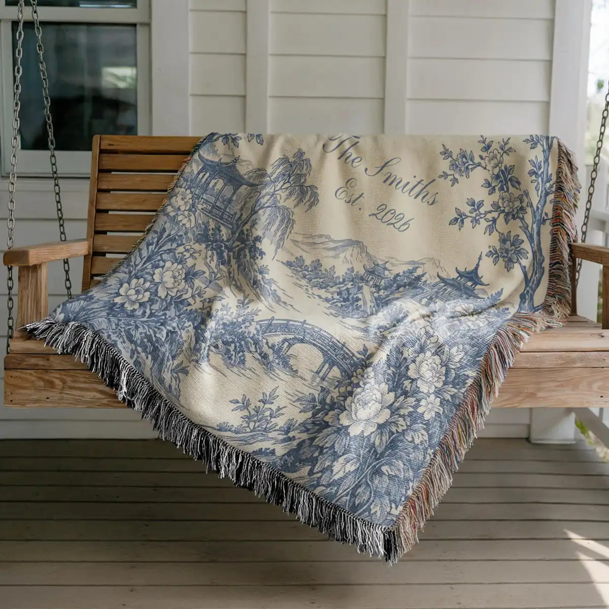 Personalized scenic toile fringe woven blanket shown in a styled room setting