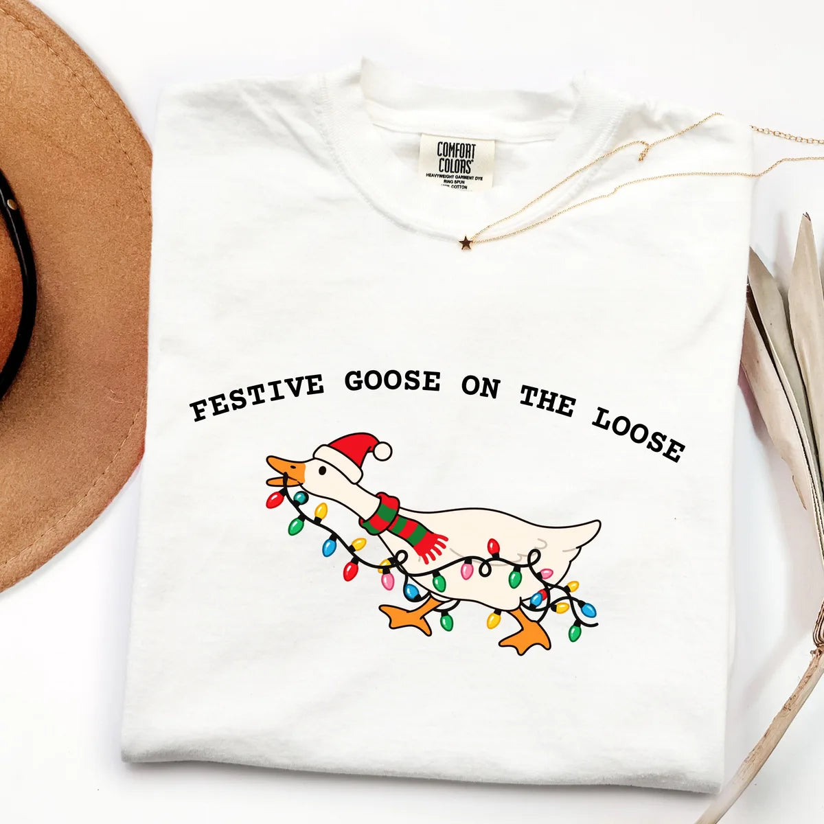 White Comfort Colors 1717 T-shirt with Festive Goose on the Loose Christmas design worn by a model view 3