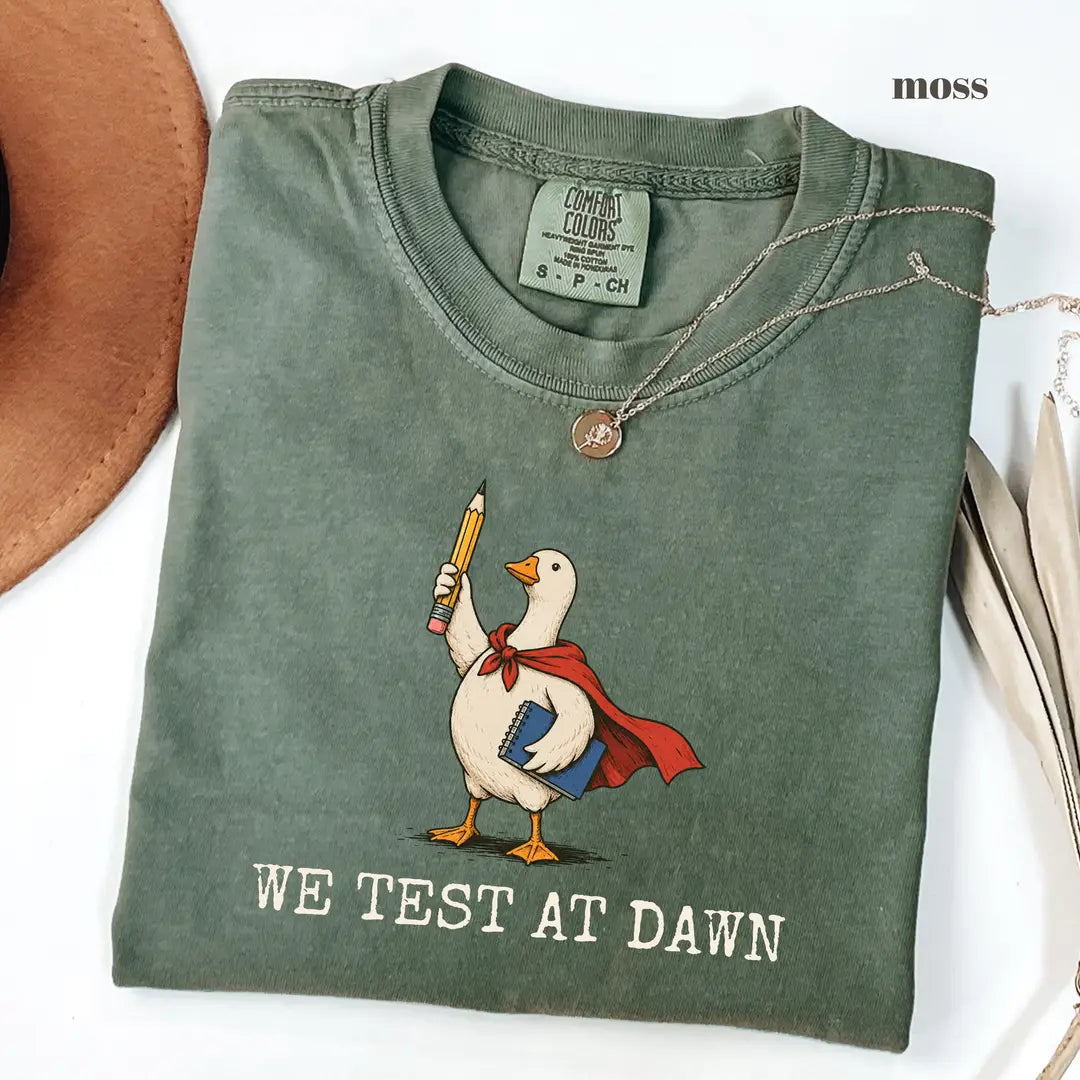Moss Comfort Colors 1717 T-shirt with We Test at Dawn Teacher design worn by a model view 2