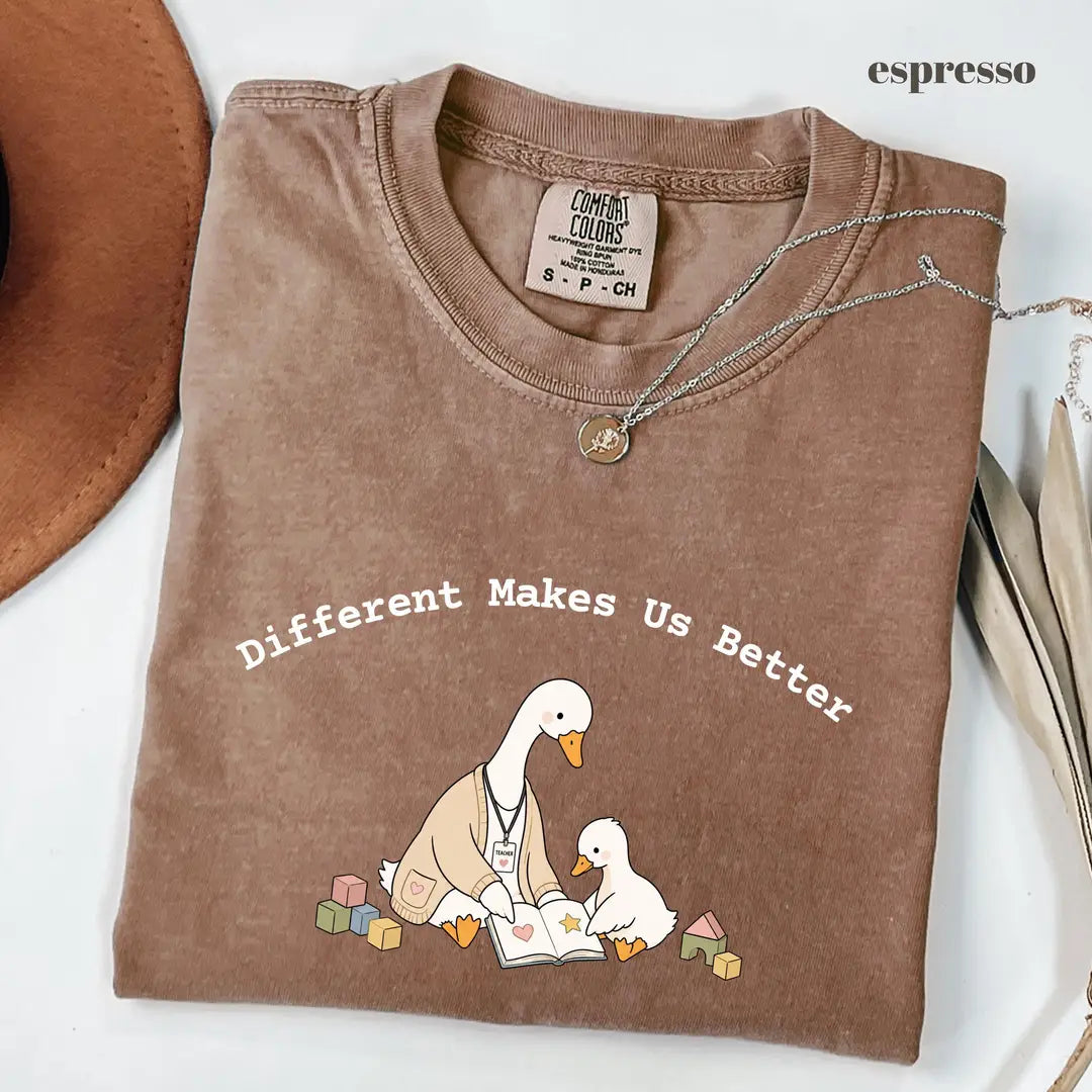 Espresso Comfort Colors 1717 T-shirt with Different Makes Us Better design worn by a model