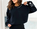 Black Crewneck sweatshirt with embroidered Custom Mama with Kid Name on Sleeve design, alternate product view.