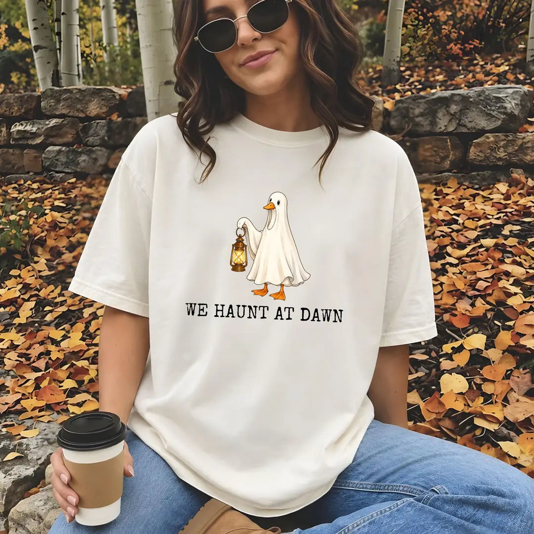 Comfort Colors 1717 T-shirt with We Haunt At Dawn Goose design worn by a model