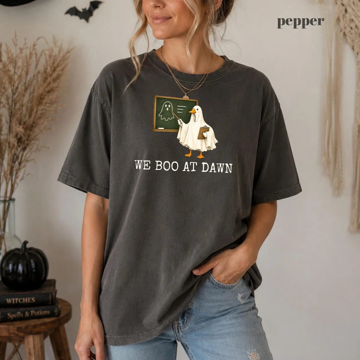 Comfort Colors 1717 T-shirt with We Boo At Dawn Goose design worn by a model