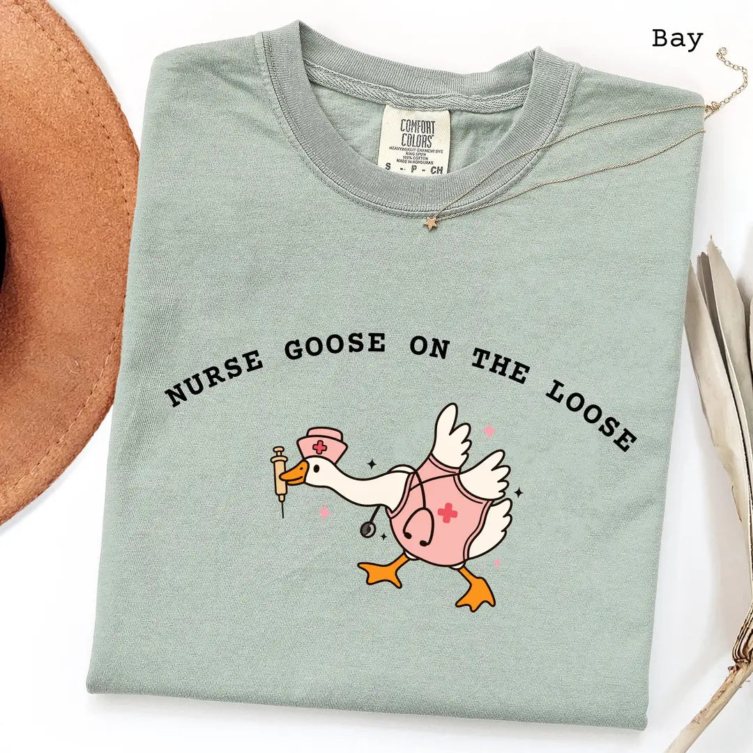 Bay Comfort Colors 1717 T-shirt with Nurse Goose on the Loose design worn by a model