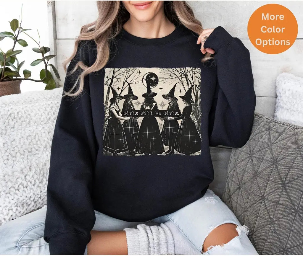 Black Crewneck sweatshirt with printed Vintage Girls Will Be Girls Witch design shown on a model.