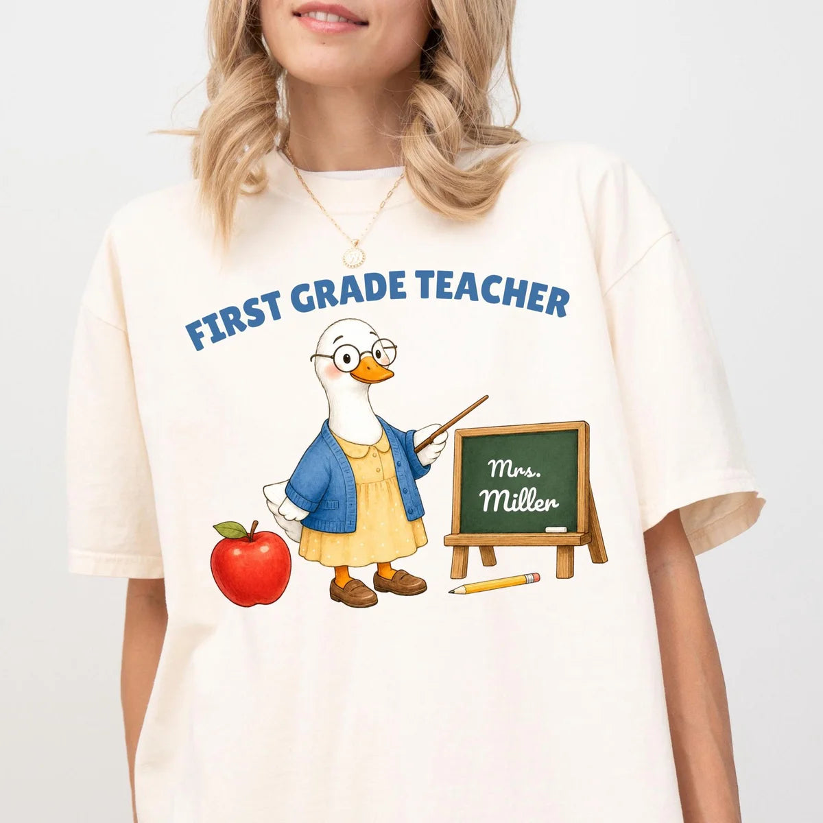 Comfort Colors 1717 T-shirt with First Grade Teacher design worn by a model