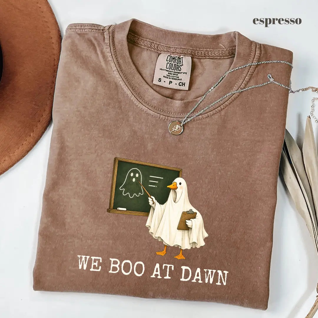 Espresso Comfort Colors 1717 T-shirt with We Boo At Dawn Goose design worn by a model