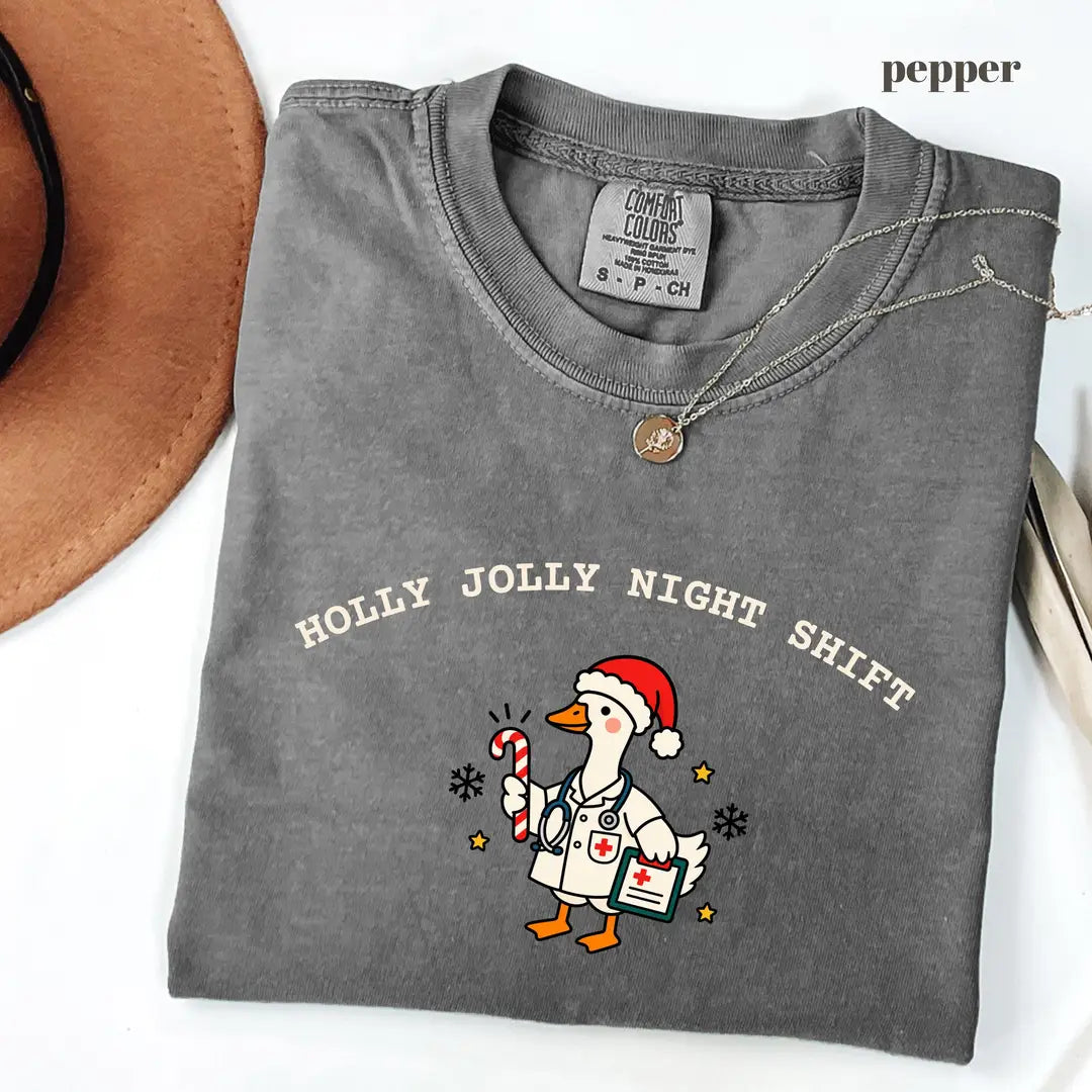 Pepper Comfort Colors 1717 T-shirt with Christmas Nurse design worn by a model