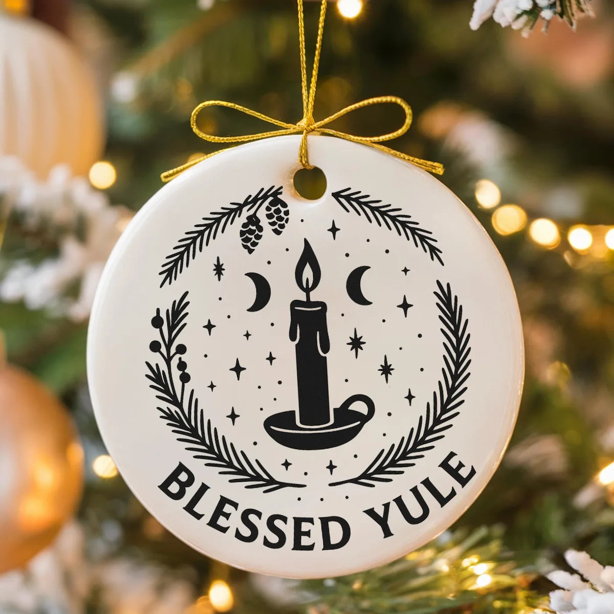 round ceramic ornament with the visible Blessed Yule message.