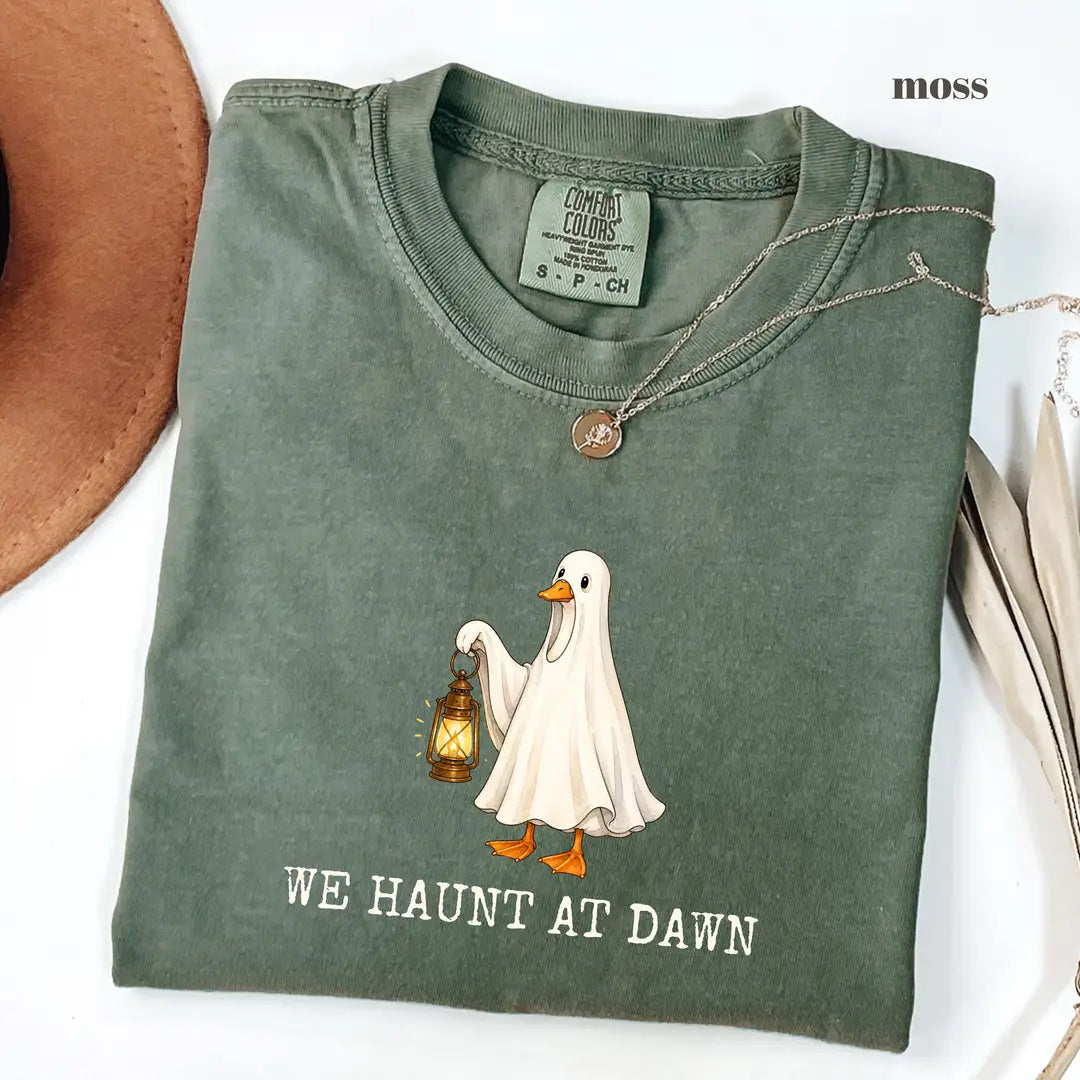 Moss Comfort Colors 1717 T-shirt with We Haunt At Dawn Goose design worn by a model