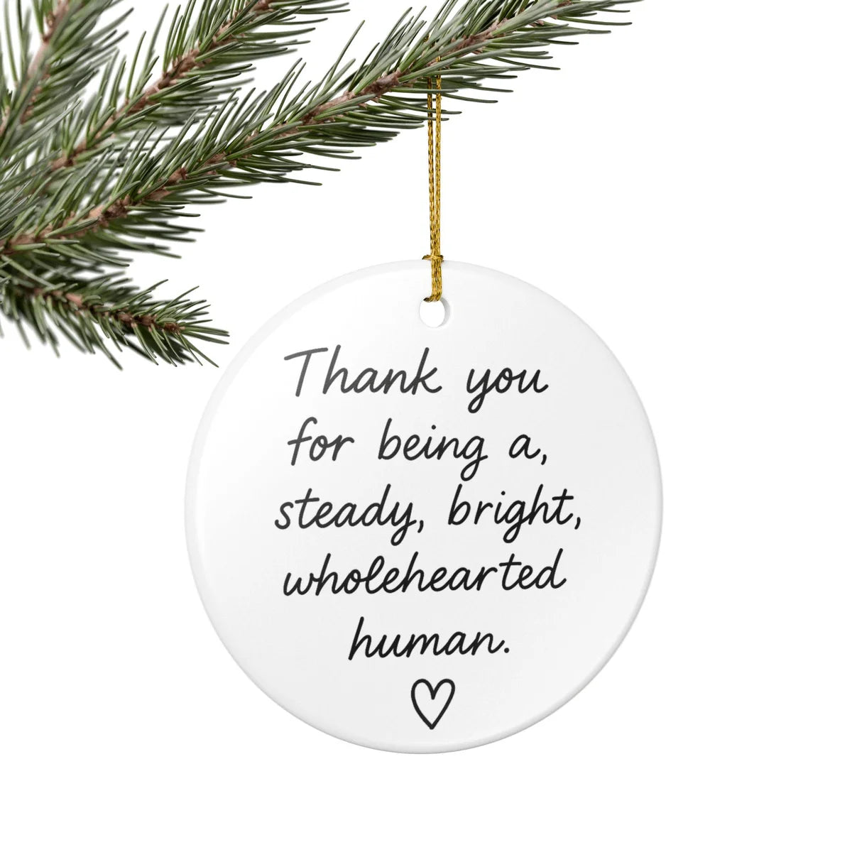 Alternate view of a round ceramic ornament with the visible Steady Bright Wholehearted message.