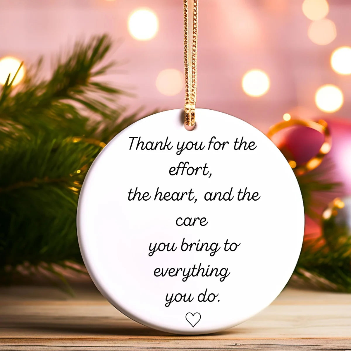 Alternate view of a round ceramic ornament with the visible Thank You for Your Effort message.
