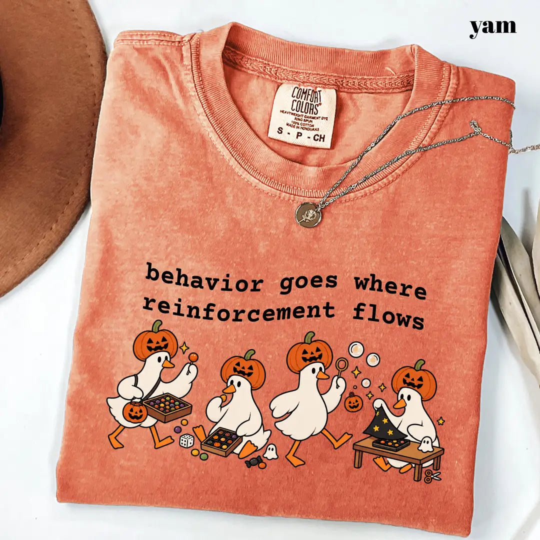Yam Comfort Colors 1717 T-shirt with Behavior Goes Where Reinforcement Flows design worn by a model
