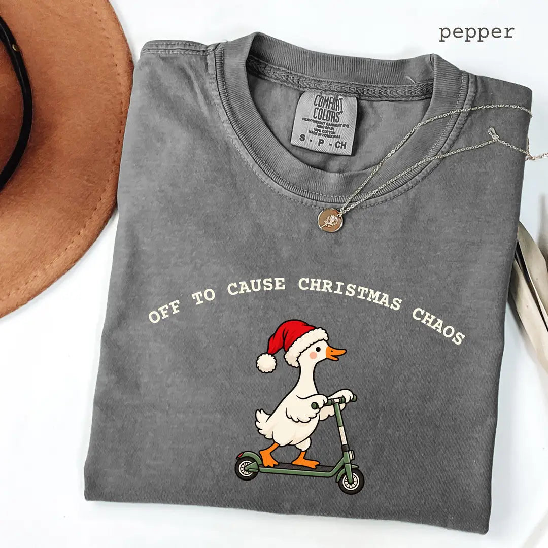 Pepper Comfort Colors 1717 T-shirt with Christmas Goose design worn by a model