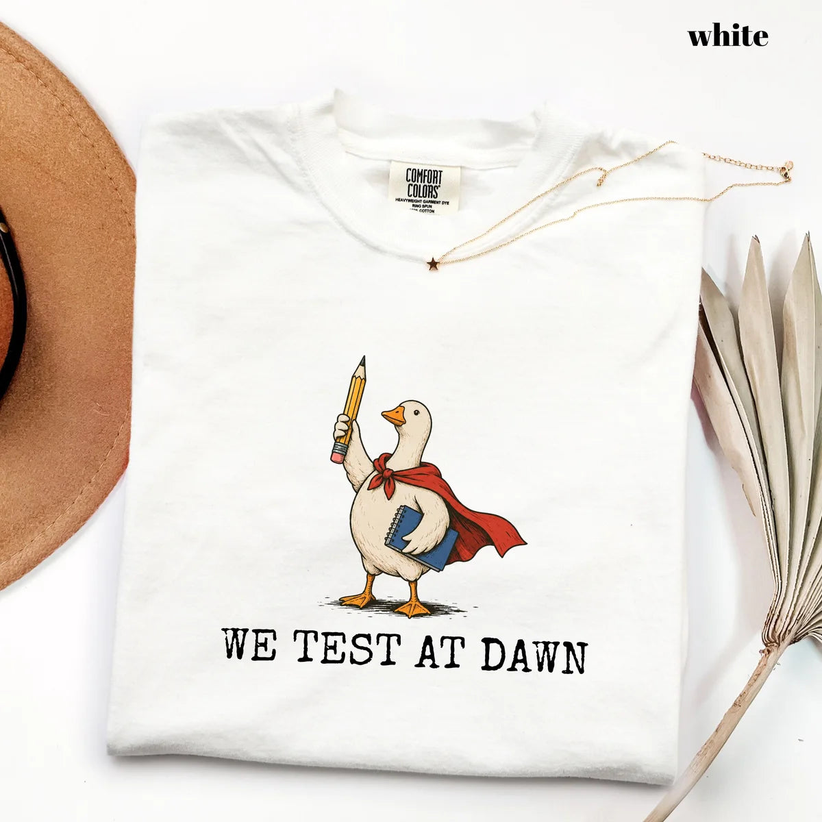 White Comfort Colors 1717 T-shirt with We Test at Dawn Teacher design worn by a model
