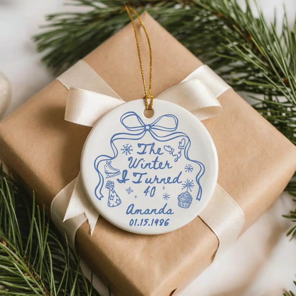 Personalized ceramic ornament featuring Winter I Turned 40.