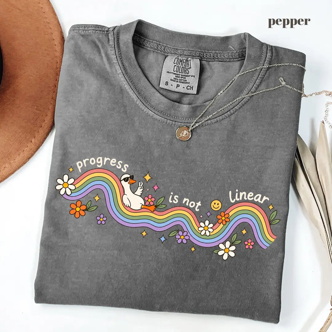 Pepper Comfort Colors 1717 T-shirt with Progress Is Not Linear design worn by a model
