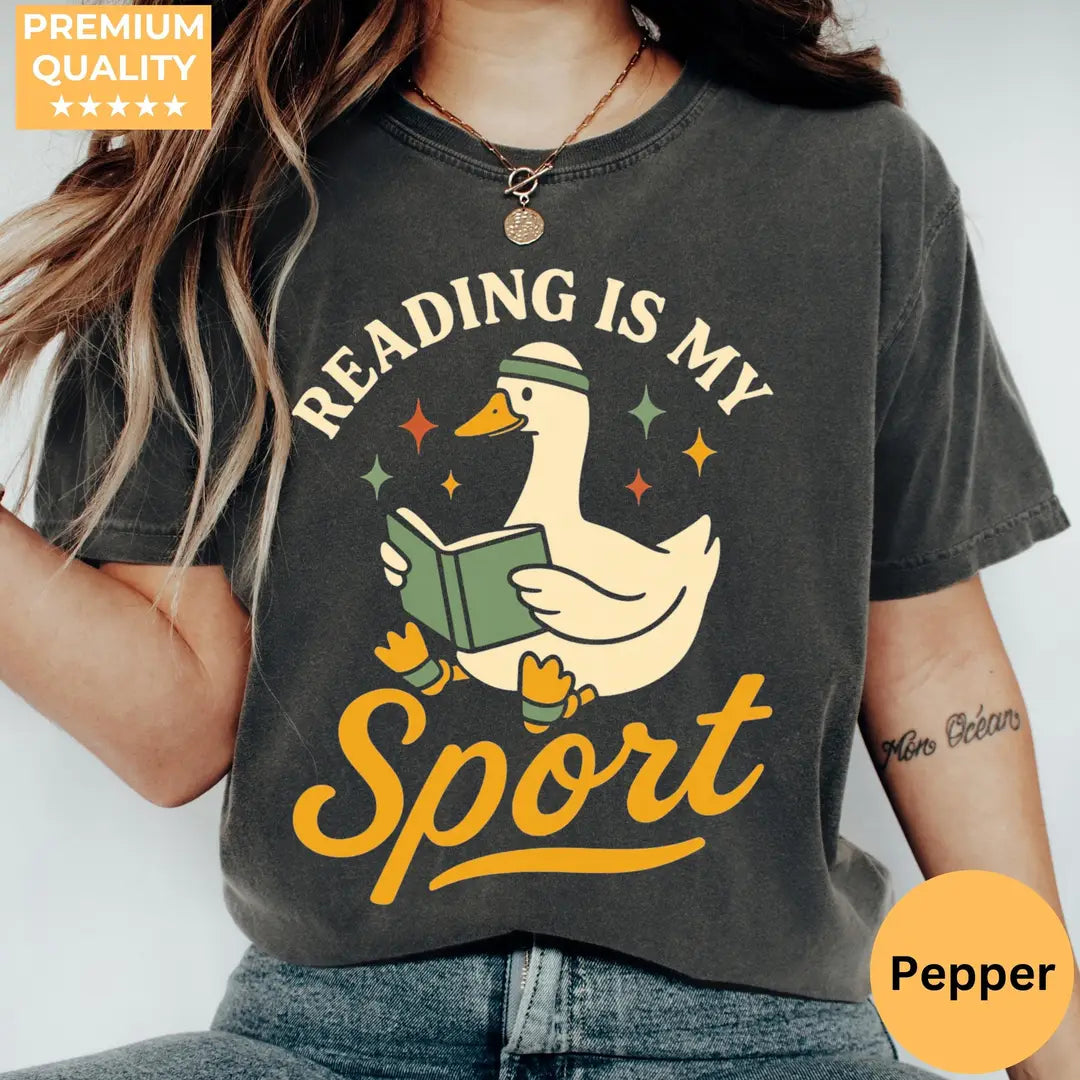 Pepper Comfort Colors 1717 T-shirt with Reading Goose design, hero view.