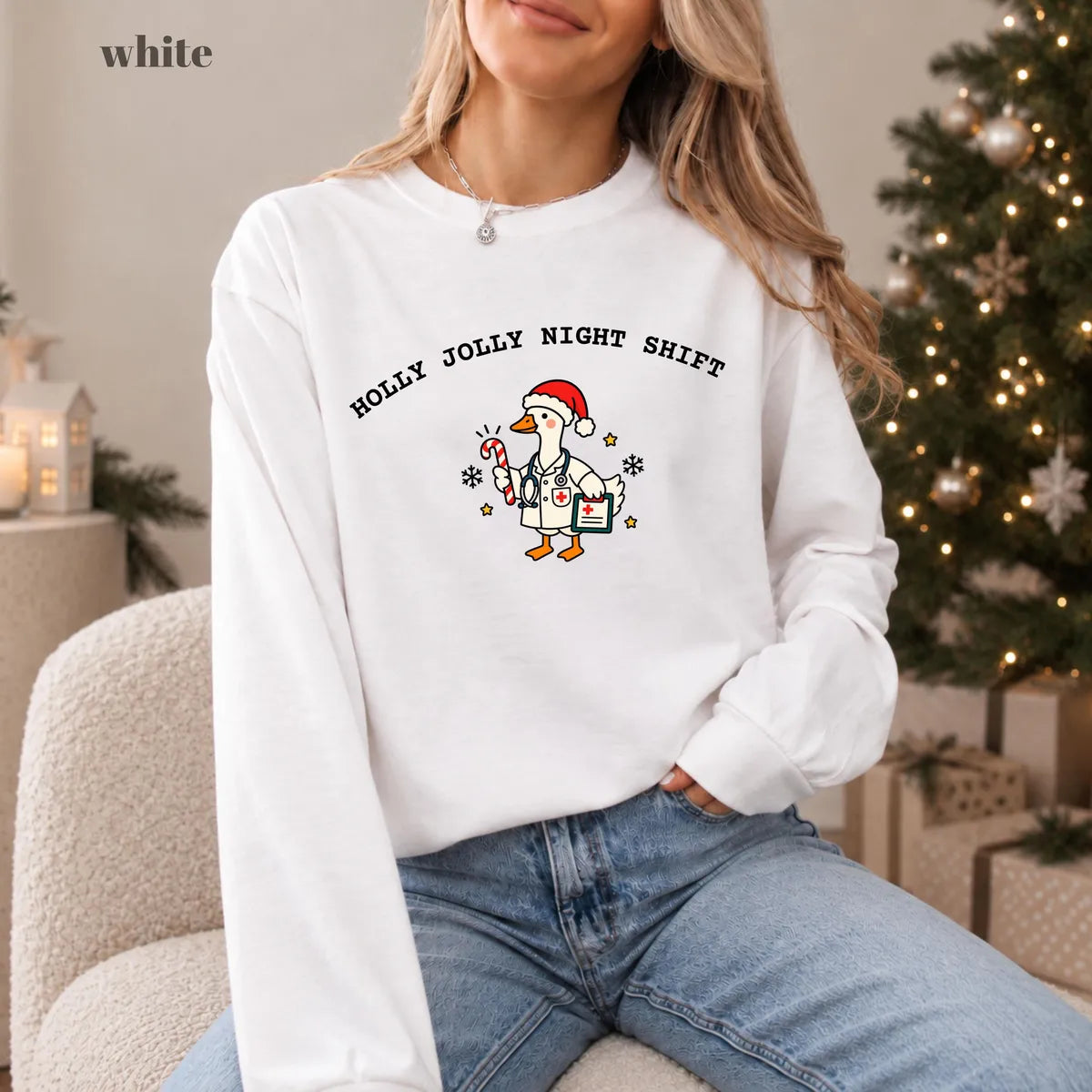 White Comfort Colors 1717 T-shirt with Christmas Nurse design worn by a model