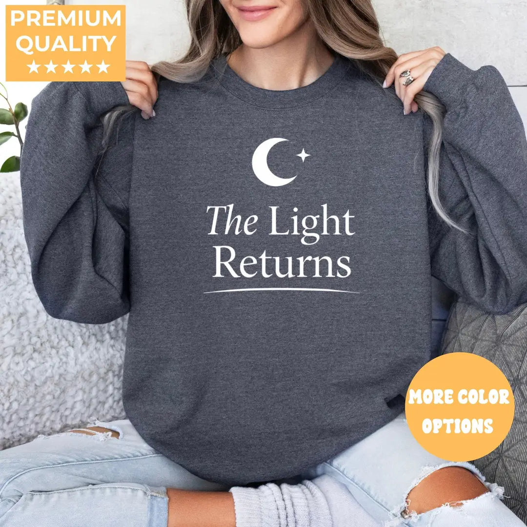 Crewneck sweatshirt with The Light Returns design, alternate product view.