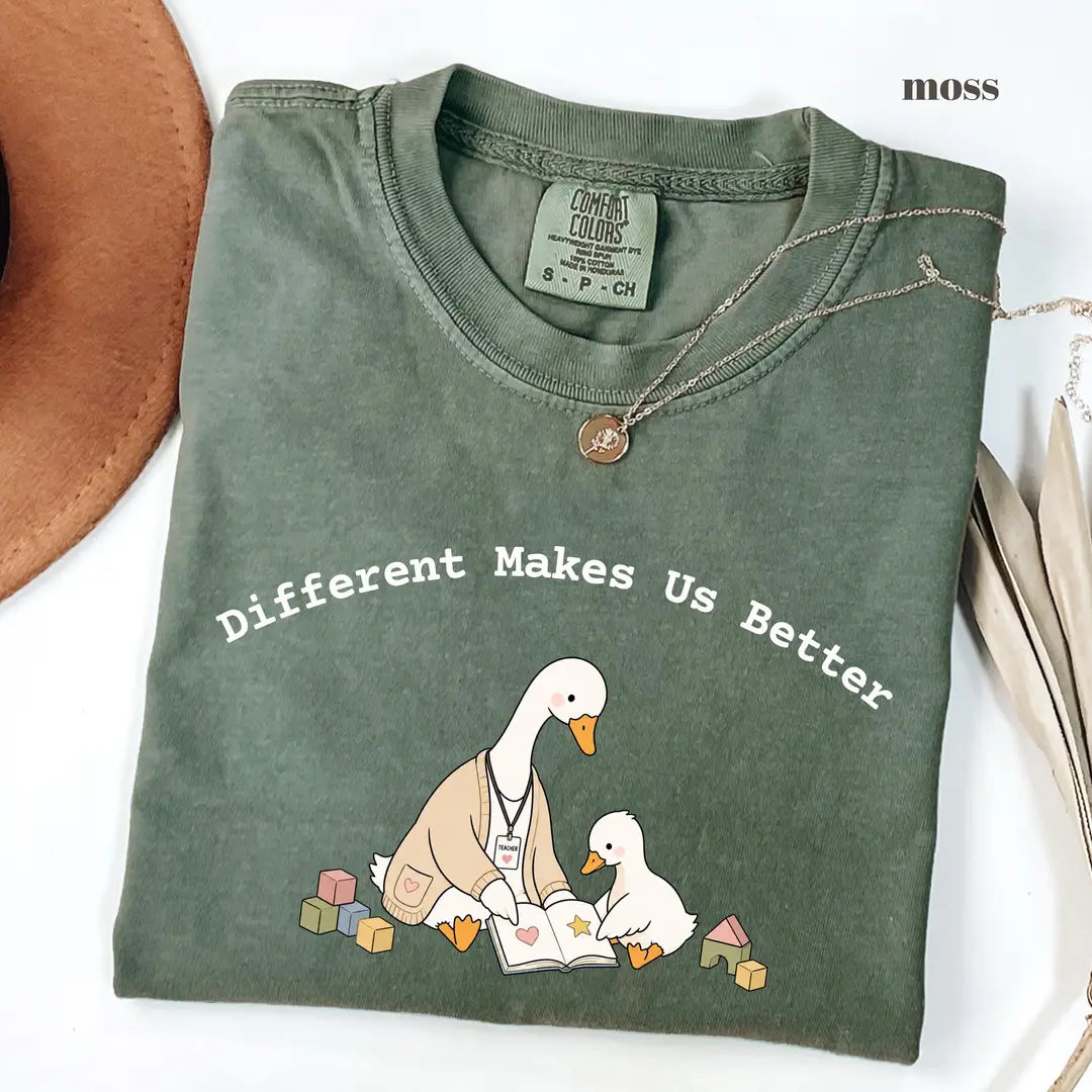 Moss Comfort Colors 1717 T-shirt with Different Makes Us Better design worn by a model
