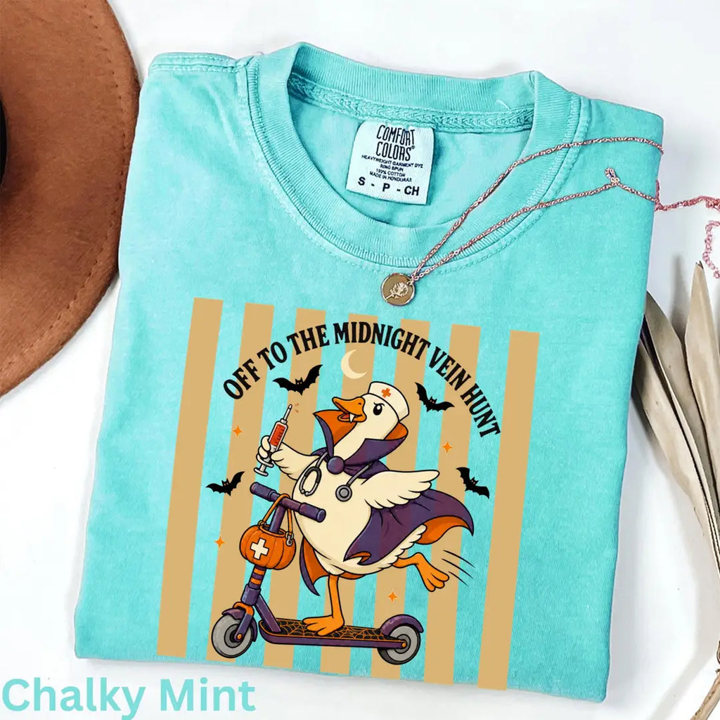 Off to the Midnight Vein Hunt - Nurse Goose Halloween Comfort Colors T-Shirt alternate product view in Chalky Mint.