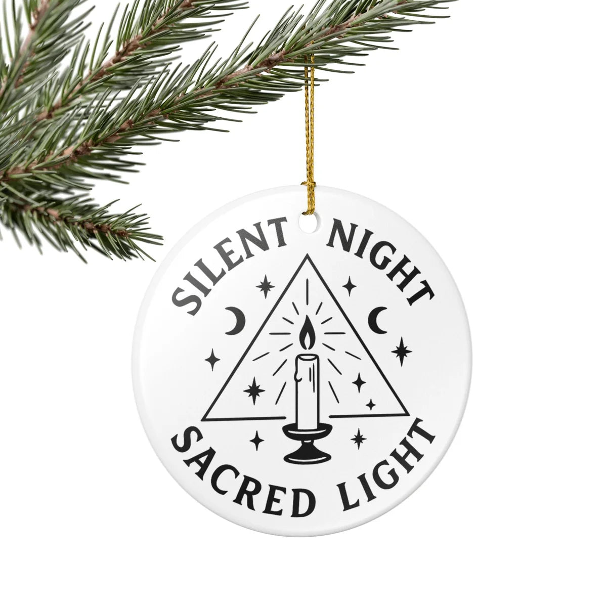Alternate view of a round ceramic ornament with the visible Silent Night Sacred Light message.