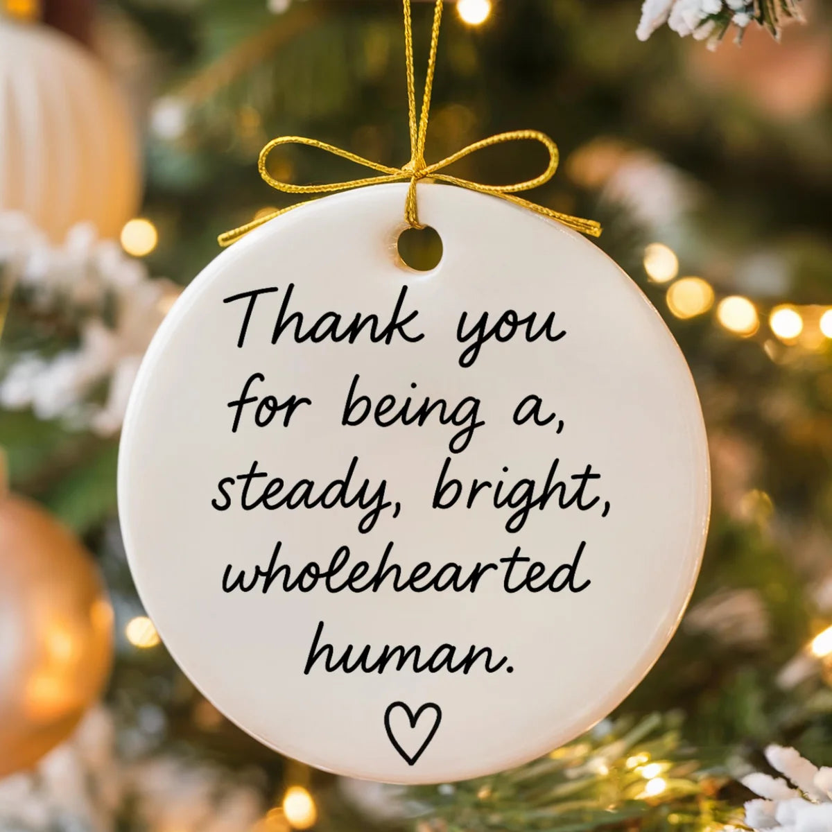 round ceramic ornament with the visible Steady Bright Wholehearted message.