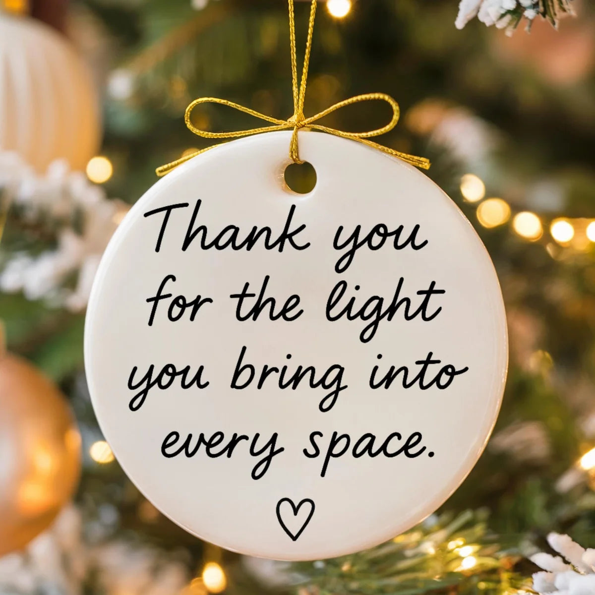 round ceramic ornament with the visible Thank You for the Light You Bring message.