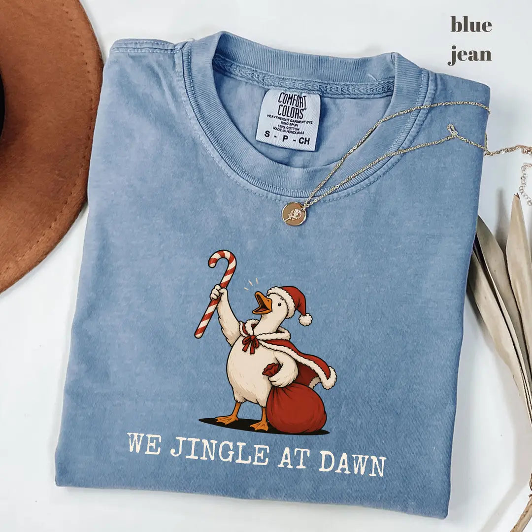 Blue Jean Comfort Colors 1717 T-shirt with We Jingle at Dawn Christmas design worn by a model