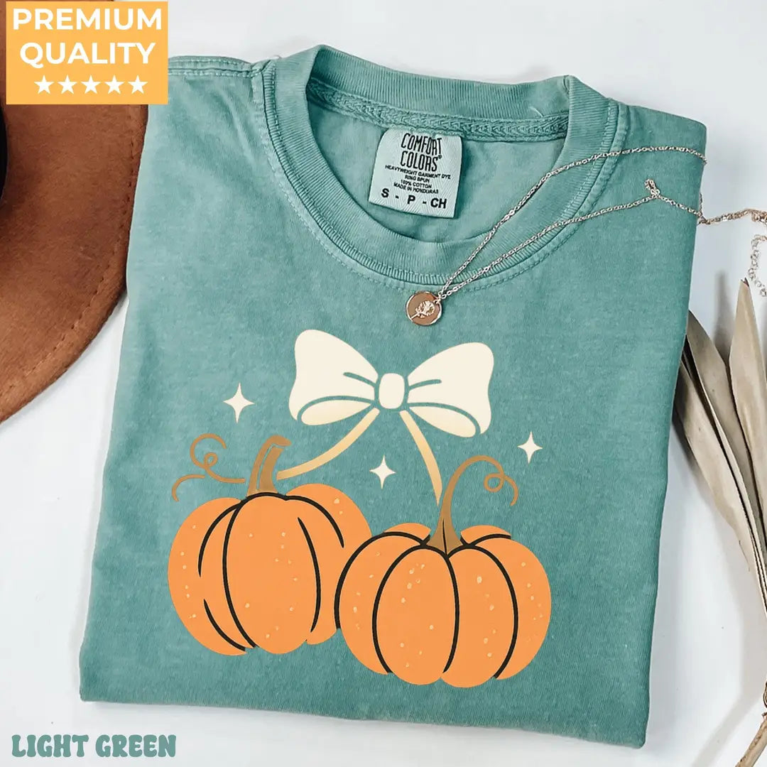 Coquette Bow Pumpkins - Women's Halloween Comfort Colors T-Shirt alternate product view in Light Green.