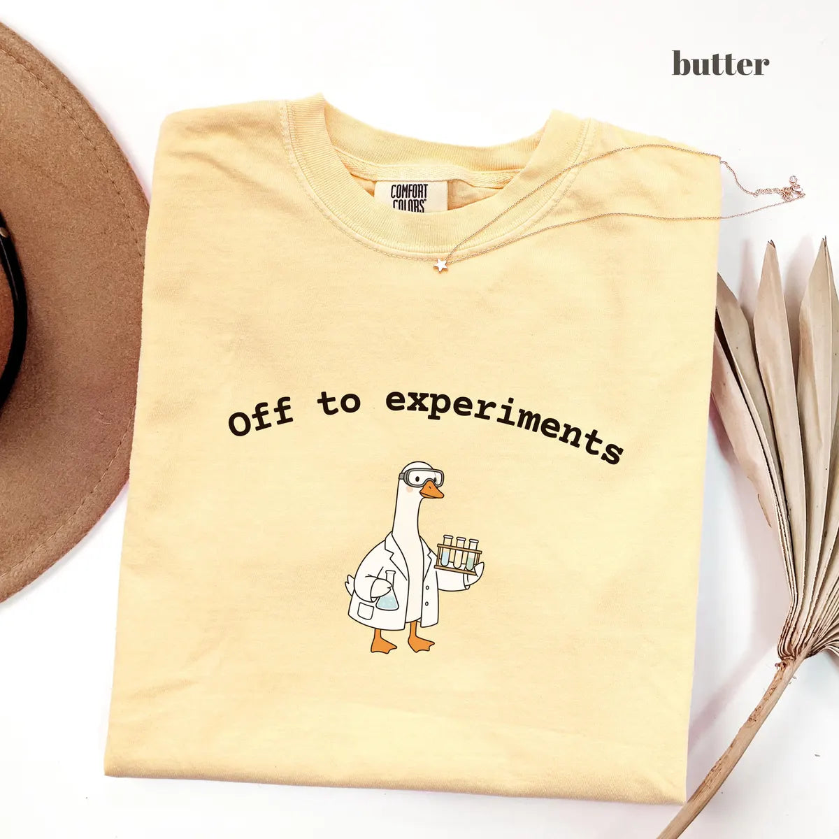 Butter Comfort Colors 1717 T-shirt with Off To Experiments design worn by a model