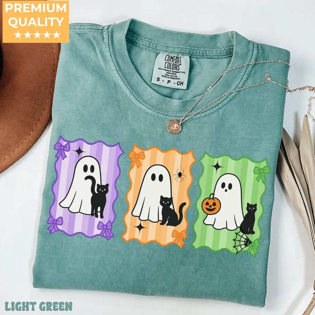 Colorful Ghost & Black Cat Panels - Halloween Comfort Colors T-Shirt alternate product view in Light Green.
