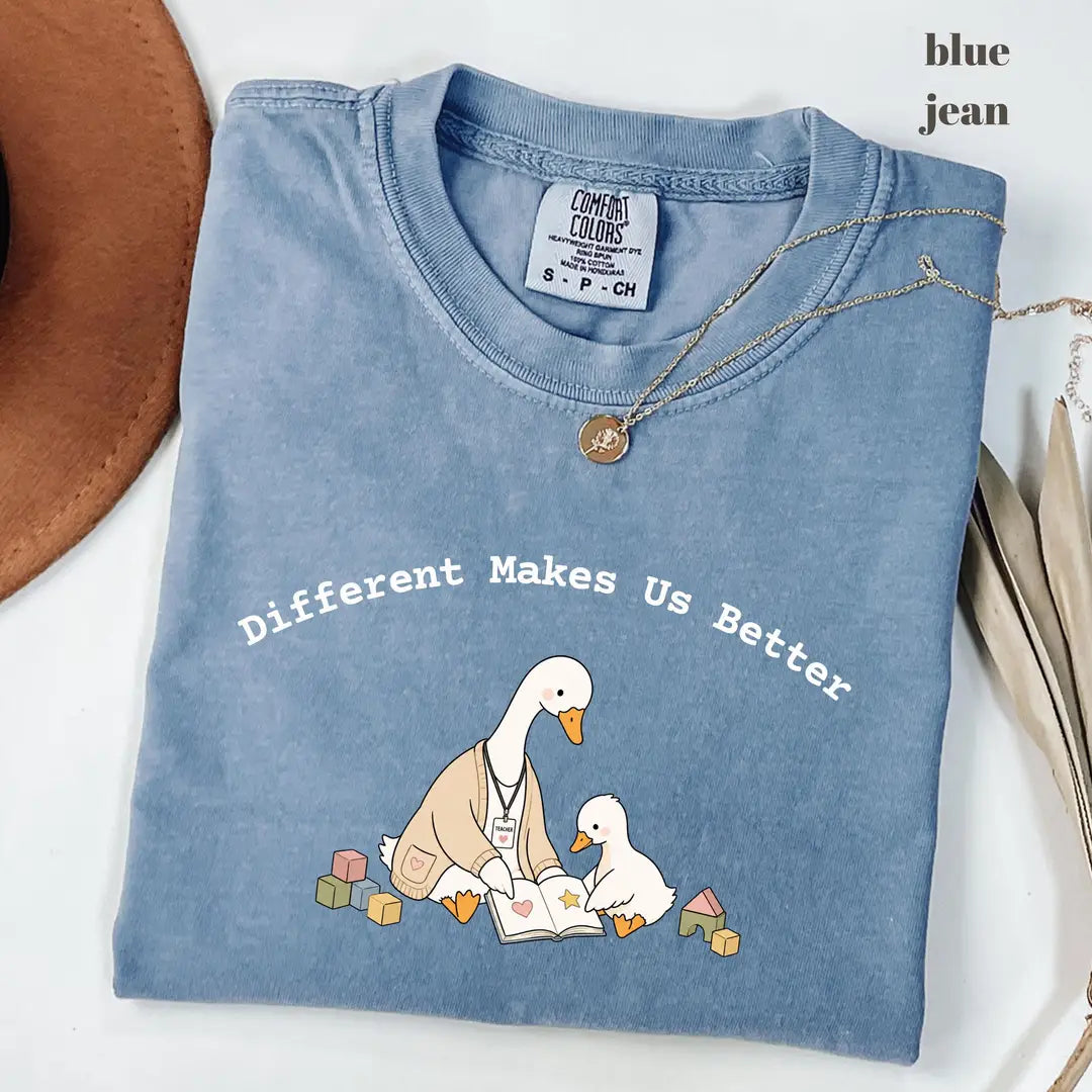 Blue Jean Comfort Colors 1717 T-shirt with Different Makes Us Better design worn by a model