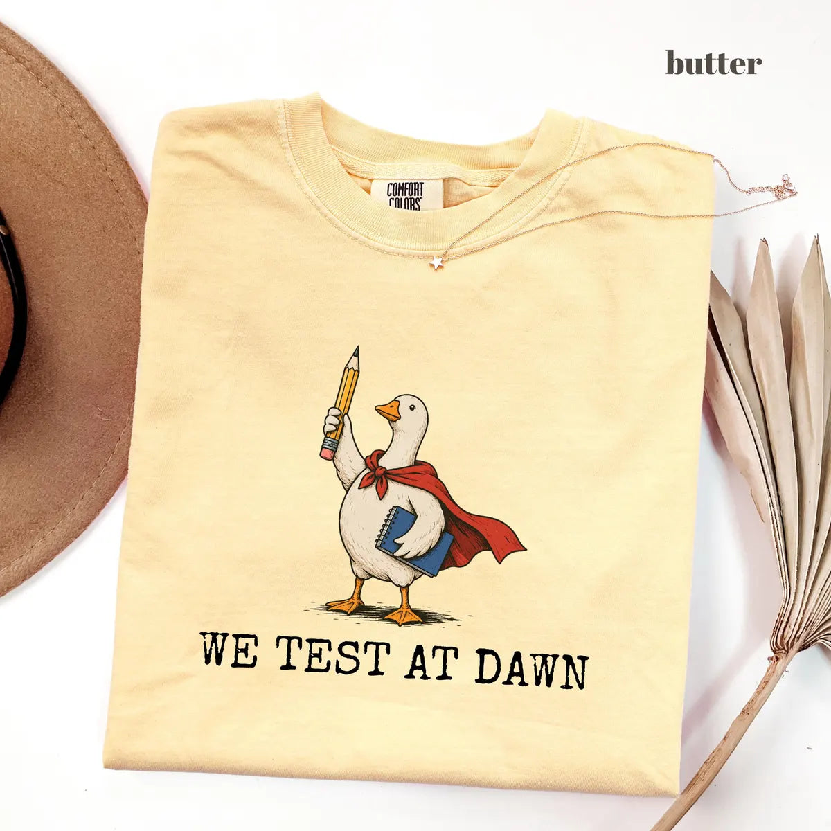 Butter Comfort Colors 1717 T-shirt with We Test at Dawn Teacher design worn by a model