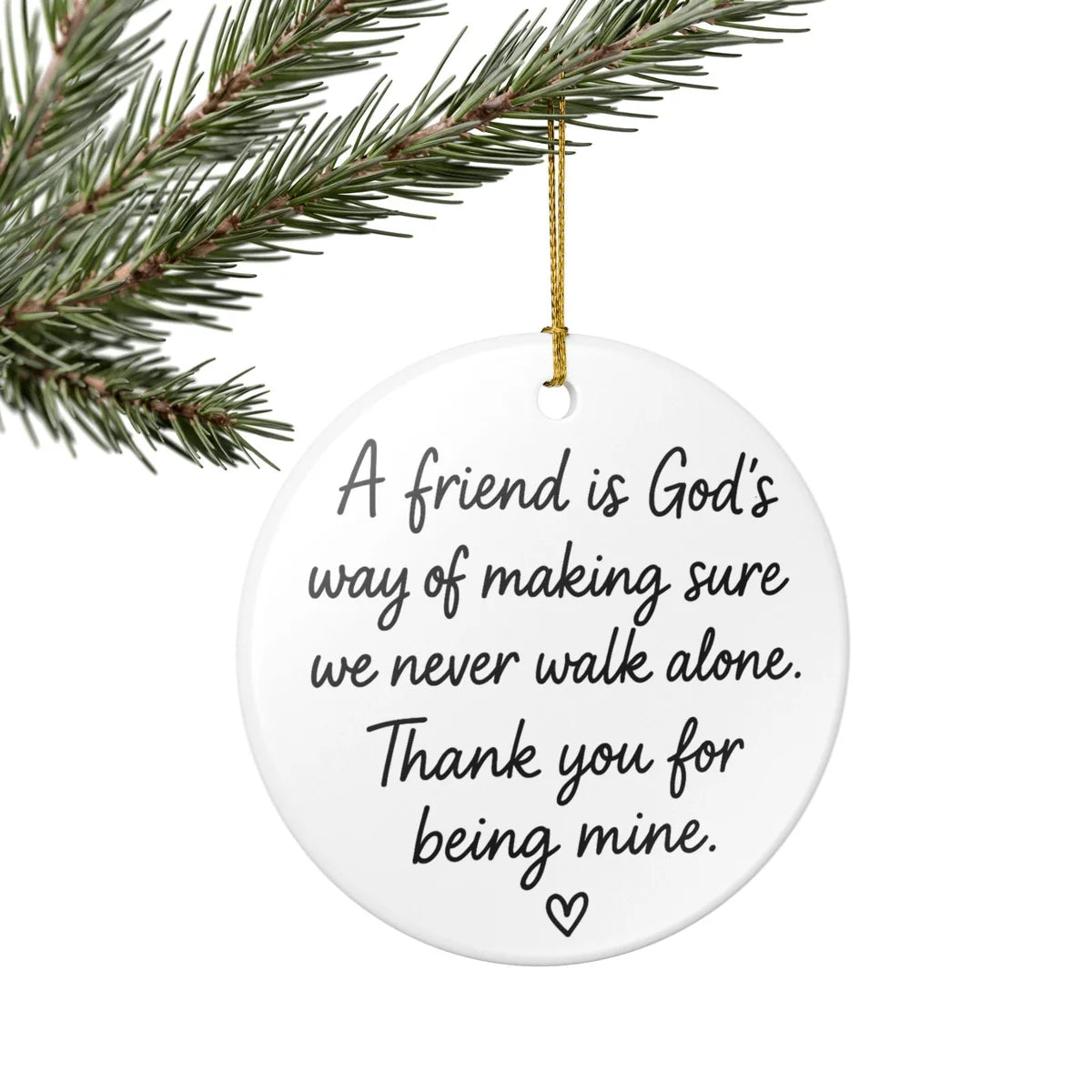 Alternate view of a round ceramic ornament with the visible A Friend Is God's Way message.
