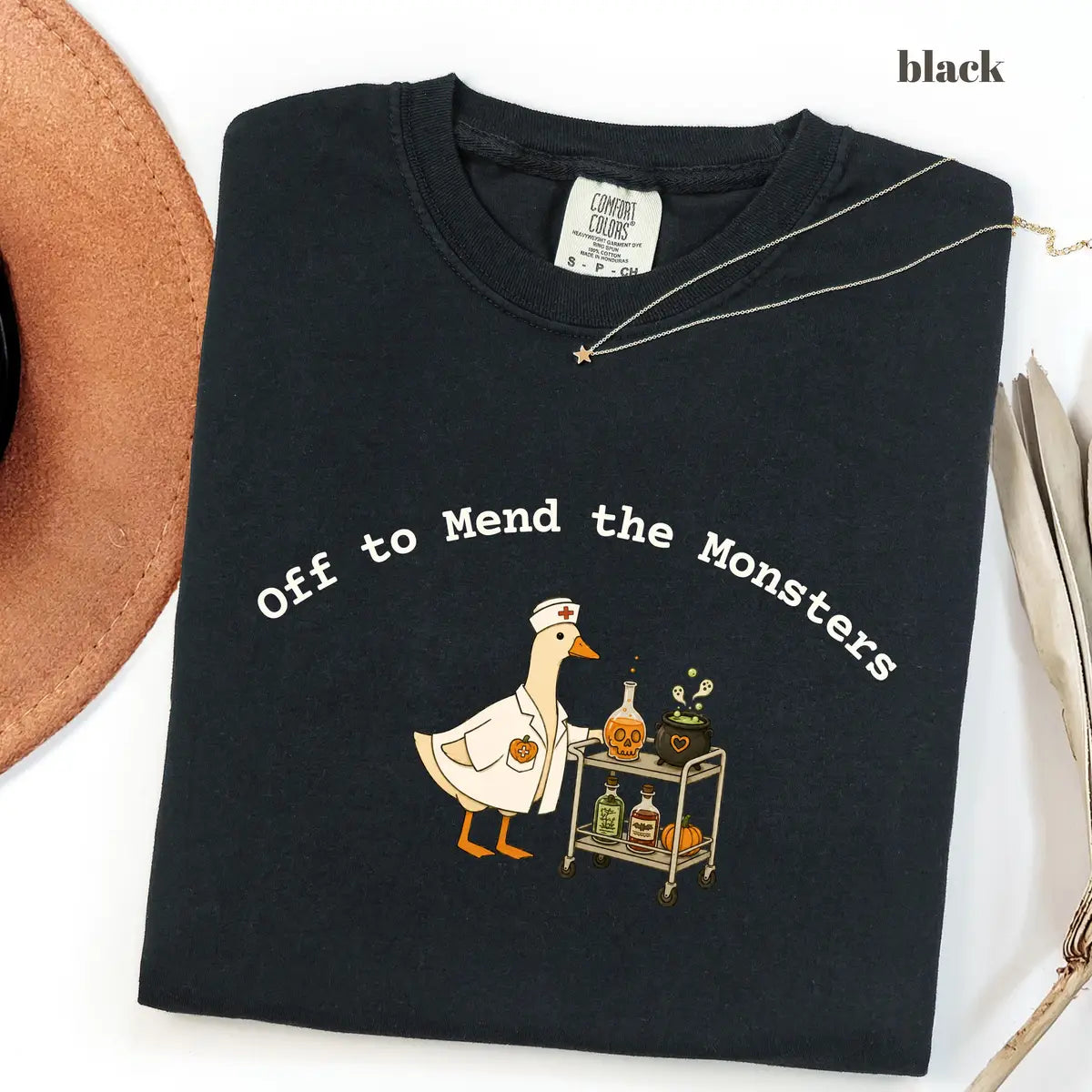Black CF Comfort Colors 1717 T-shirt with Off to Mend the Monsters design