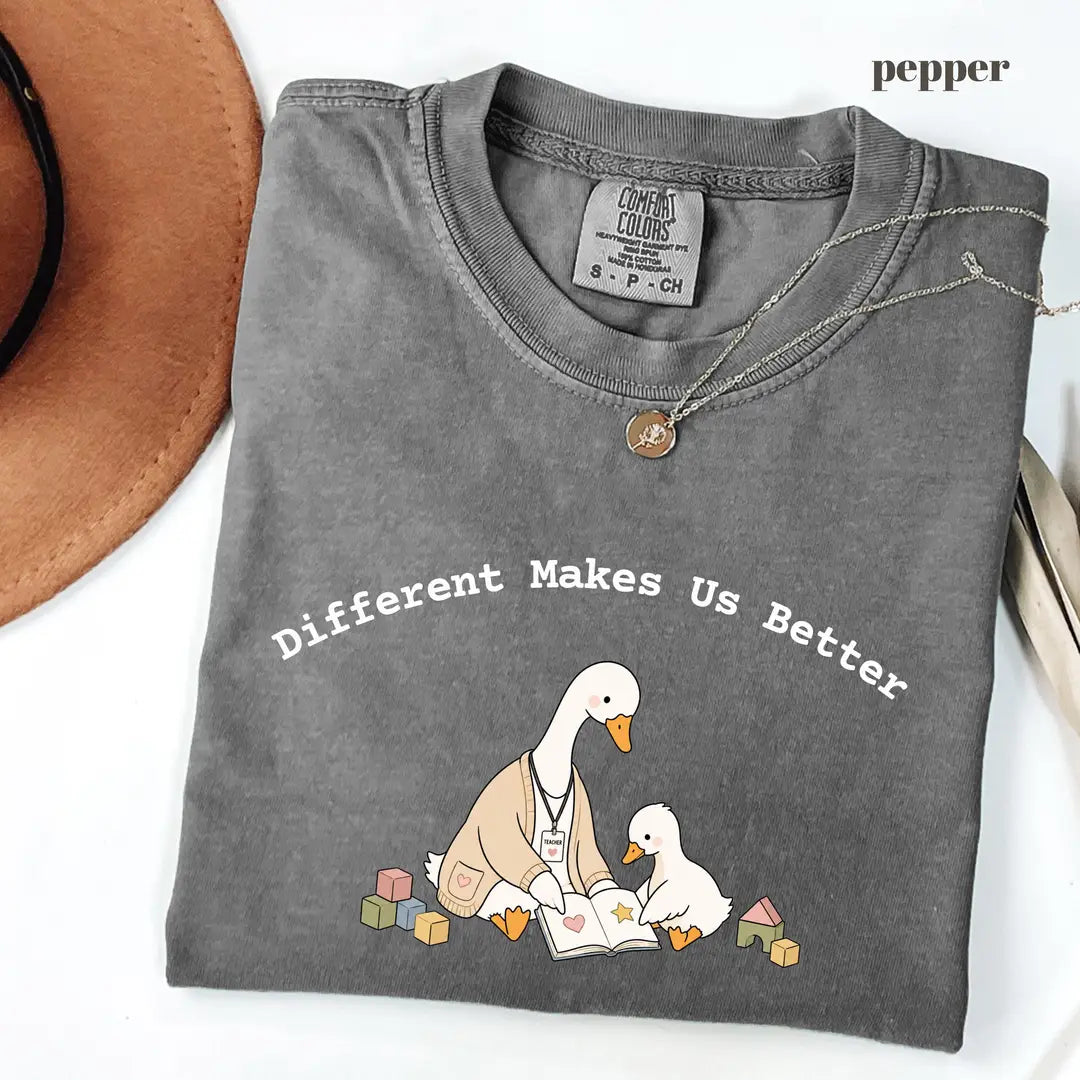 Pepper Comfort Colors 1717 T-shirt with Different Makes Us Better design worn by a model