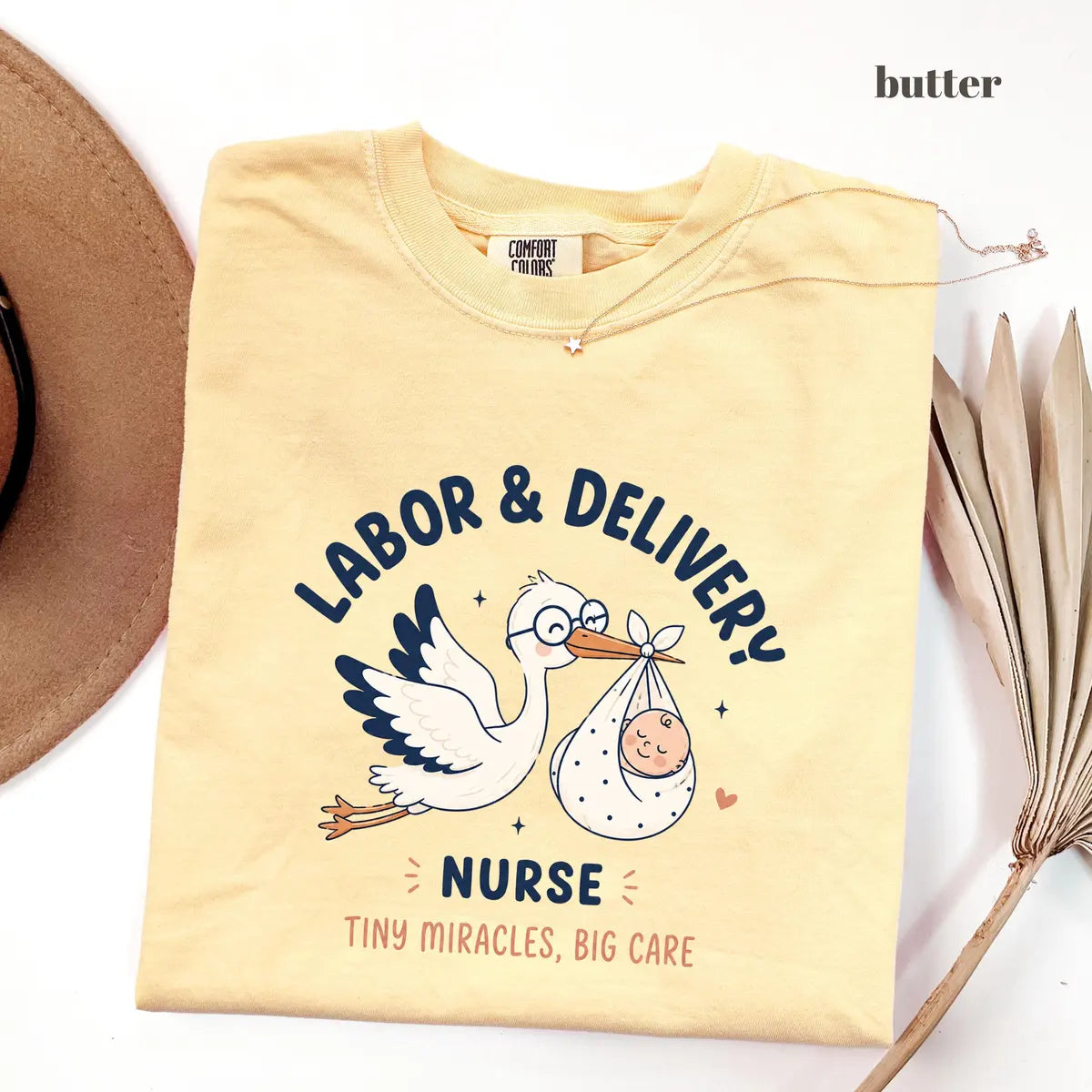 Butter Comfort Colors 1717 T-shirt with Labor and Delivery Nurse design worn by a model