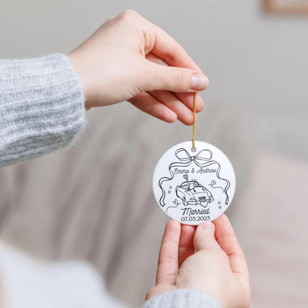 Additional view of a First Christmas Married personalized ceramic ornament.