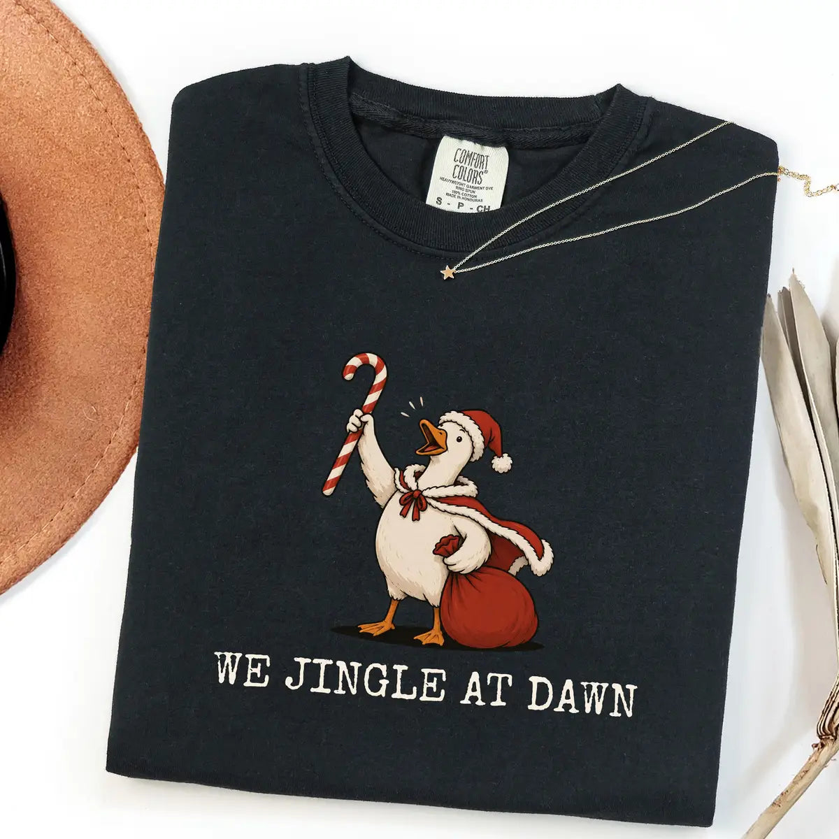 Black CF Comfort Colors 1717 T-shirt with We Jingle at Dawn Christmas design worn by a model
