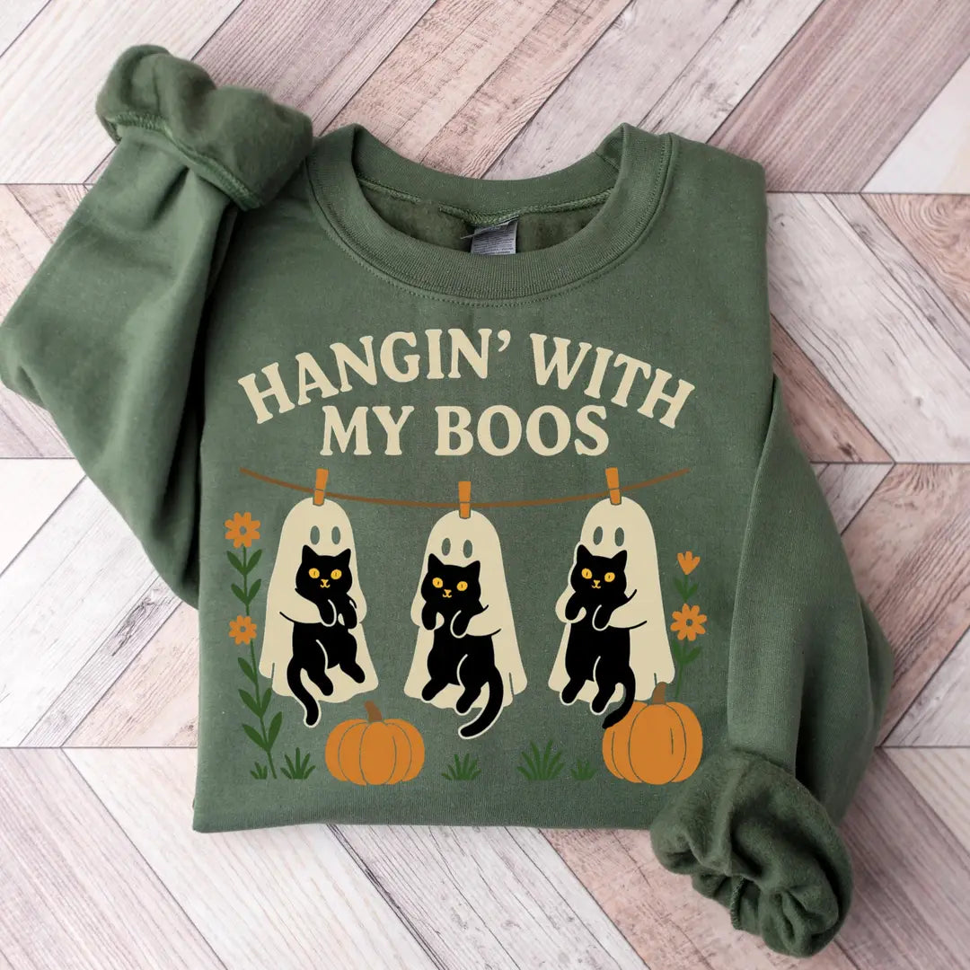 Military Green Crewneck sweatshirt with Halloween Black Cat & Ghost design, hero view.