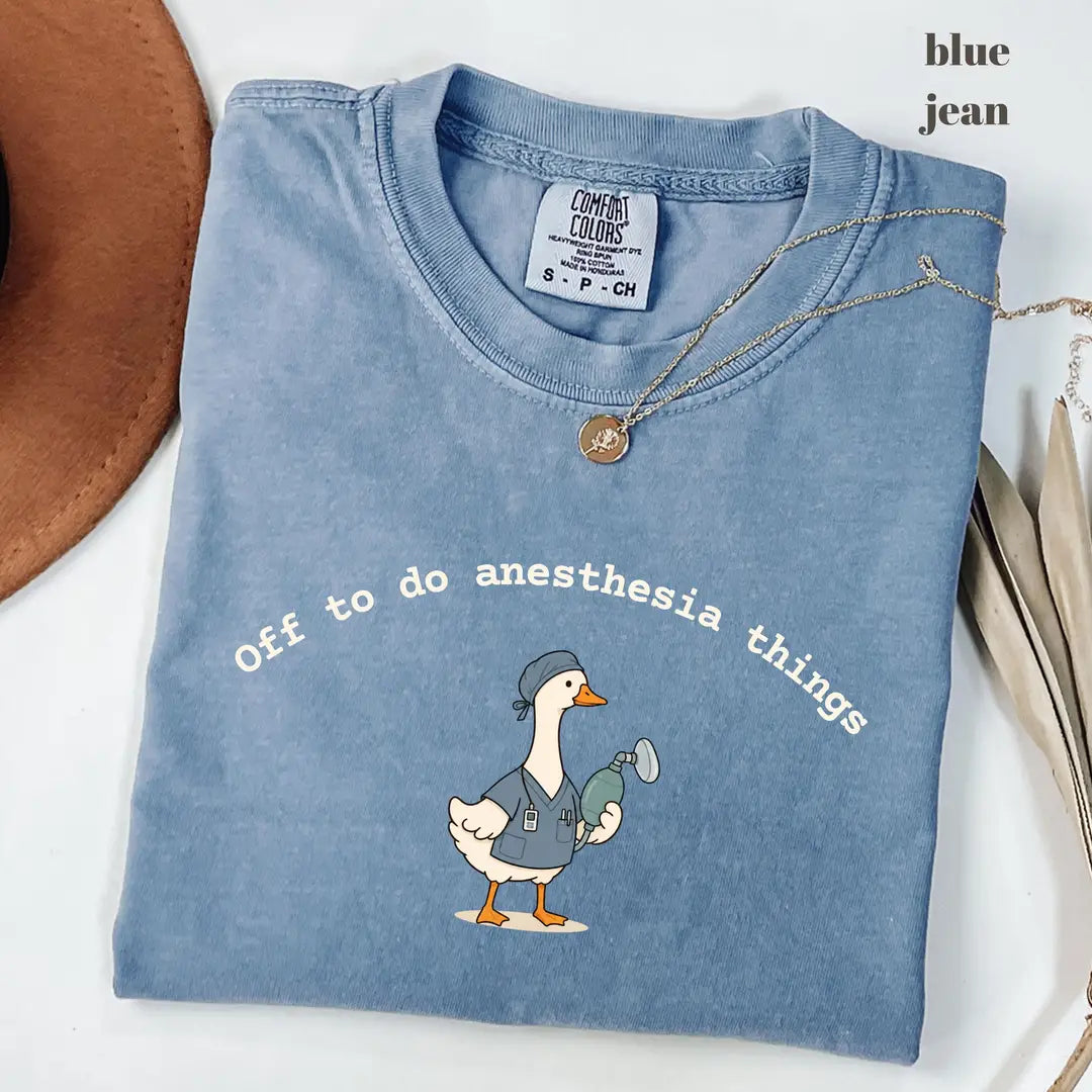 Blue Jean Comfort Colors 1717 T-shirt with Off To Do Anesthesia Things Goose design worn by a model