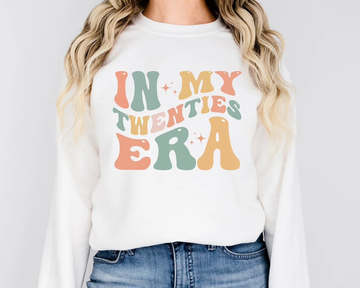 White Crewneck sweatshirt with In My Twenties Era design, alternate product view.