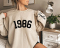 Crewneck sweatshirt with printed Custom Birth Year design, hero view.