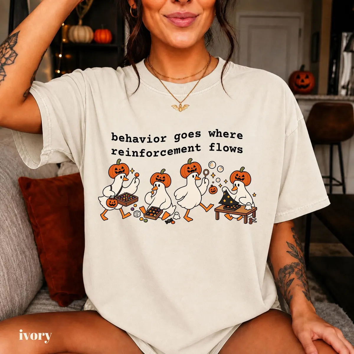 Ivory Comfort Colors 1717 T-shirt with Behavior Goes Where Reinforcement Flows design worn by a model