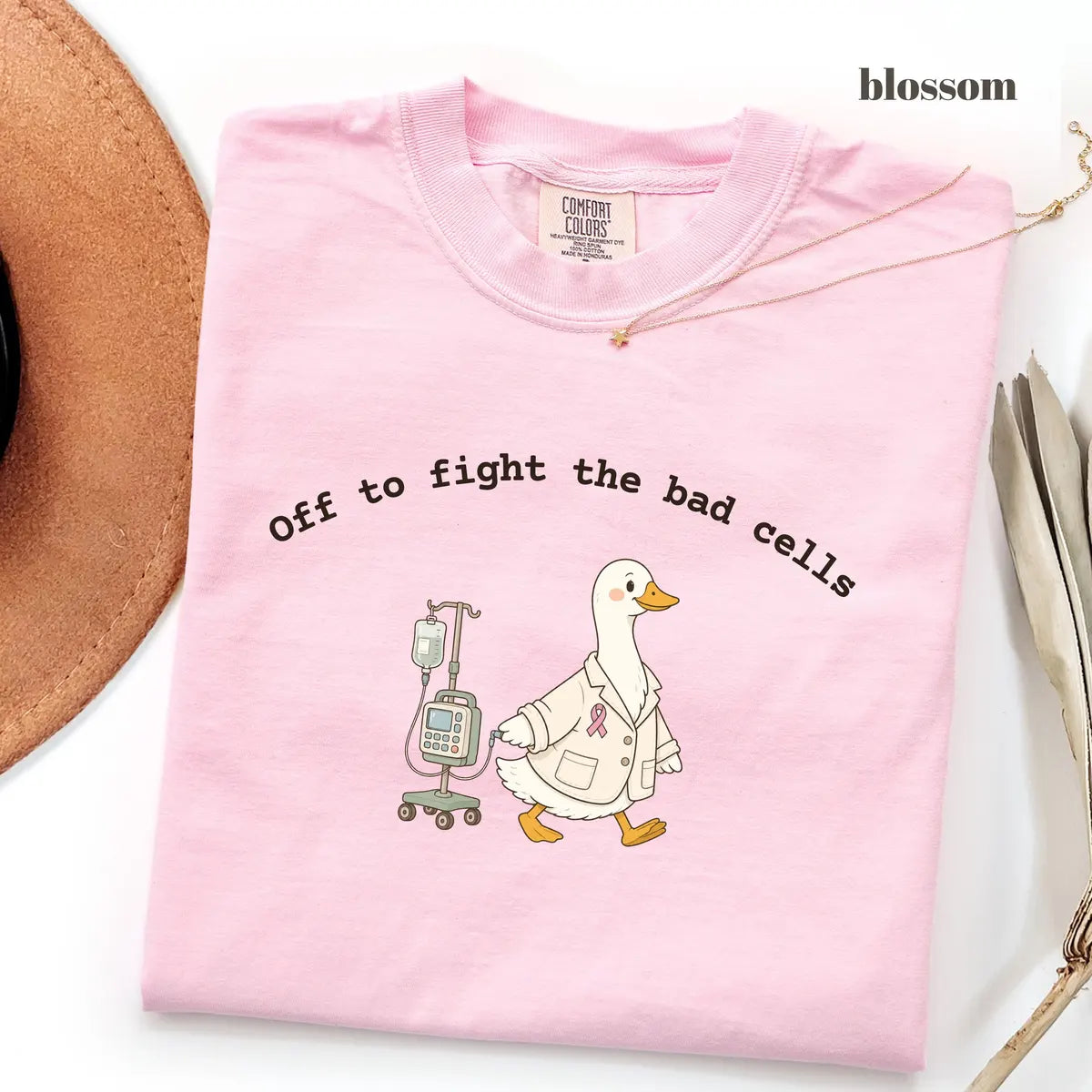 Blossom Comfort Colors 1717 T-shirt with Off to Fight the Bad Cells design worn by a model