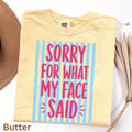 Butter Comfort Colors 1717 T-shirt with Sorry for What My Face Said design, hero view.